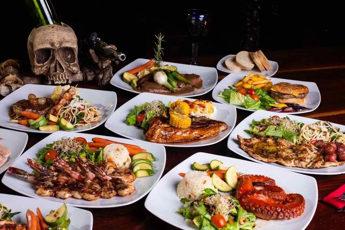 A spread of Regular and Premium dishes served on the pirate ship